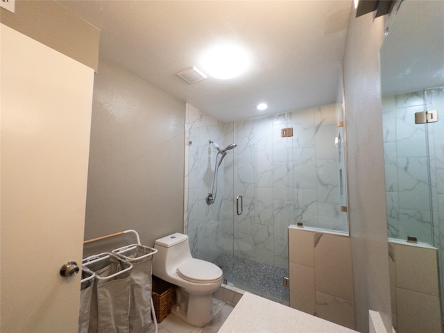 bathroom with toilet and an enclosed shower