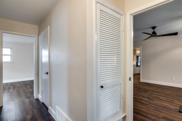 hall featuring dark hardwood / wood-style flooring