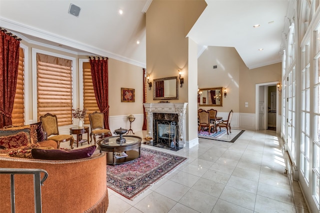 living room with crown molding, log walls, high vaulted ceiling, and a fireplace