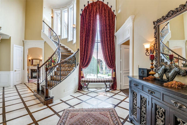 foyer with a towering ceiling