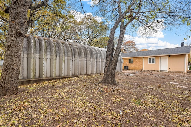 view of yard featuring central AC unit