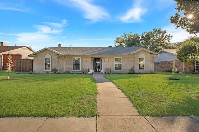 ranch-style house with a front yard