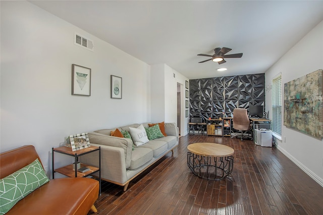 living room with hardwood / wood-style flooring and ceiling fan