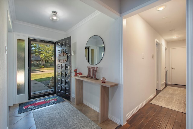 foyer entrance featuring ornamental molding