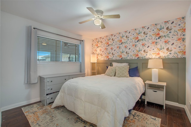 bedroom with dark wood-type flooring and ceiling fan