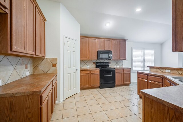 15646 Gatehouse Dr, Fort Worth, TX 76262 - kitchen with black appliances, light tile patterned floors, decorative backsplash, lofted ceiling, and recessed lighting