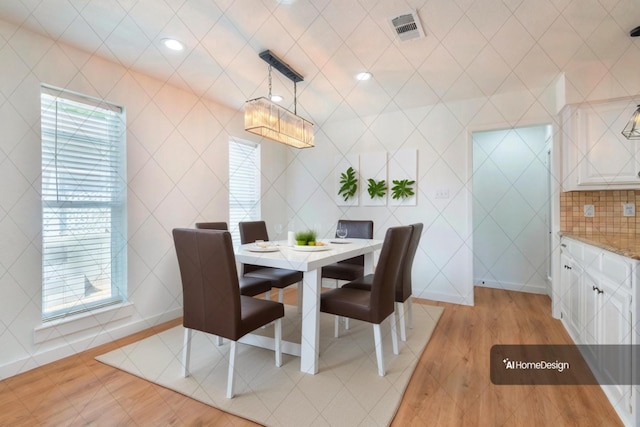 dining room with light hardwood / wood-style floors