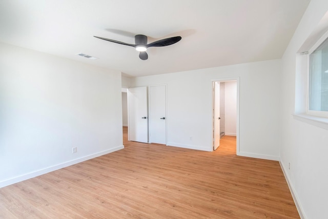 unfurnished bedroom with light hardwood / wood-style floors and ceiling fan