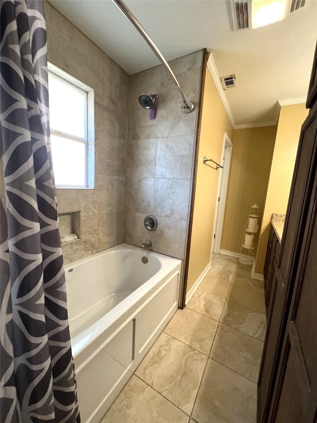 bathroom with crown molding, vanity, and shower / bath combo with shower curtain