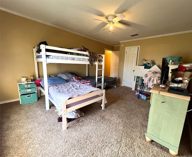 bedroom featuring crown molding, ceiling fan, and carpet