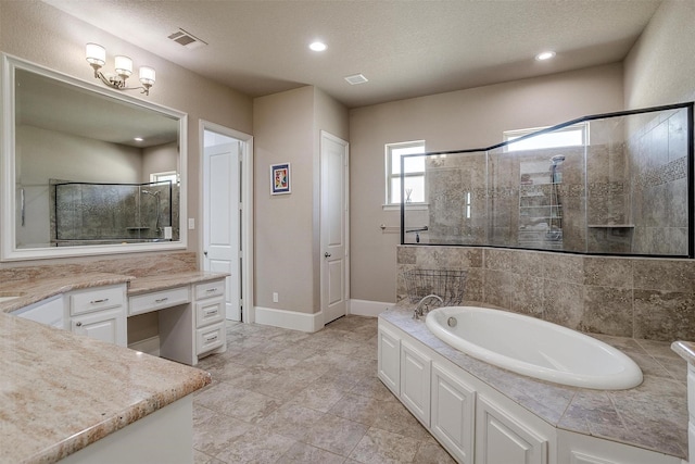 full bath with a stall shower, visible vents, a textured ceiling, vanity, and a bath