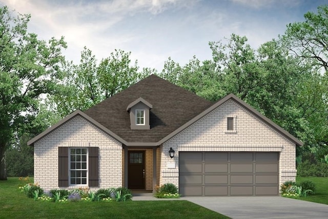 view of front of home with a front lawn and a garage