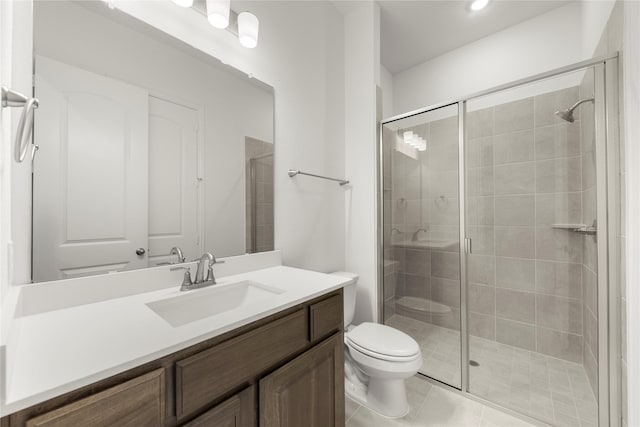 5009 Tamarack Ln, Royse City, TX 75189 - bathroom with toilet, vanity, a shower stall, and recessed lighting