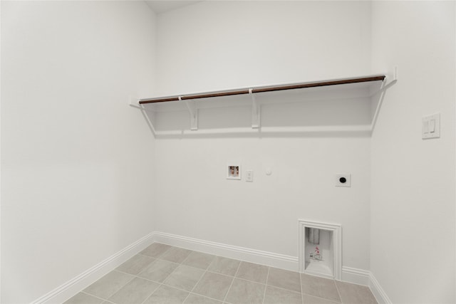 5009 Tamarack Ln, Royse City, TX 75189 - laundry area featuring hookup for a gas dryer, hookup for an electric dryer, hookup for a washing machine, and baseboards