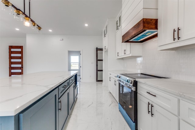 kitchen with hanging light fixtures, white cabinets, custom exhaust hood, and black range with electric cooktop