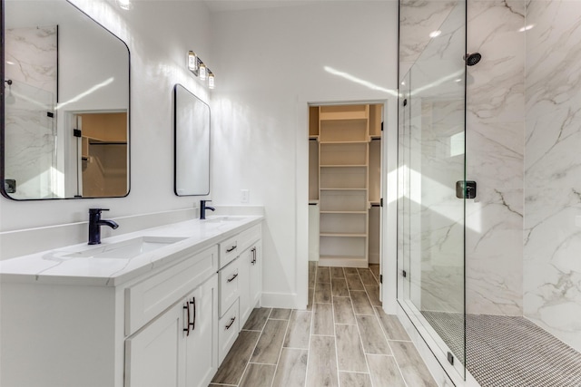 bathroom featuring vanity and walk in shower