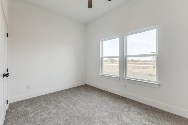 unfurnished room featuring carpet flooring and ceiling fan