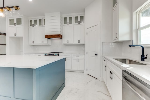 kitchen with white cabinets, stainless steel appliances, and sink