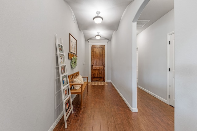 hallway featuring hardwood / wood-style flooring