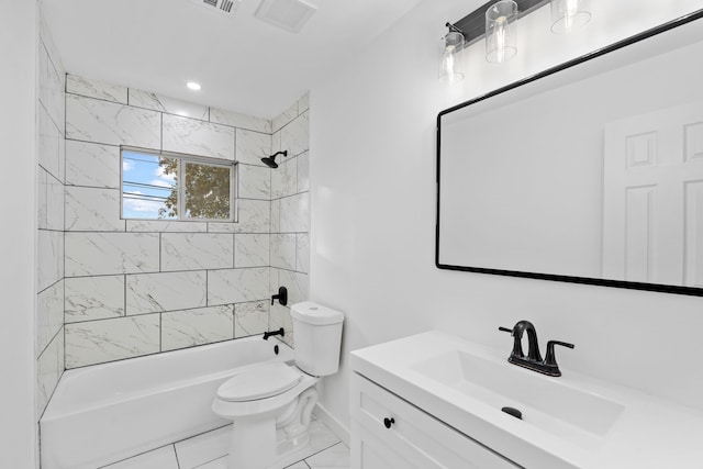 full bathroom with tiled shower / bath combo, toilet, and vanity