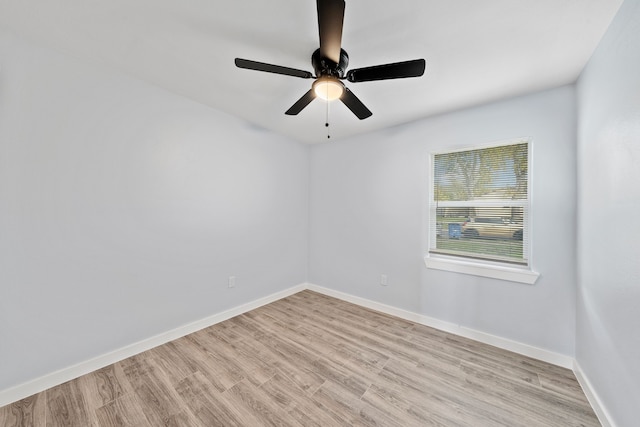 unfurnished room with ceiling fan and light hardwood / wood-style floors