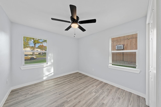 empty room featuring light hardwood / wood-style floors and ceiling fan