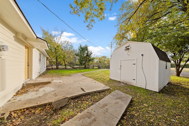 exterior space with a storage shed