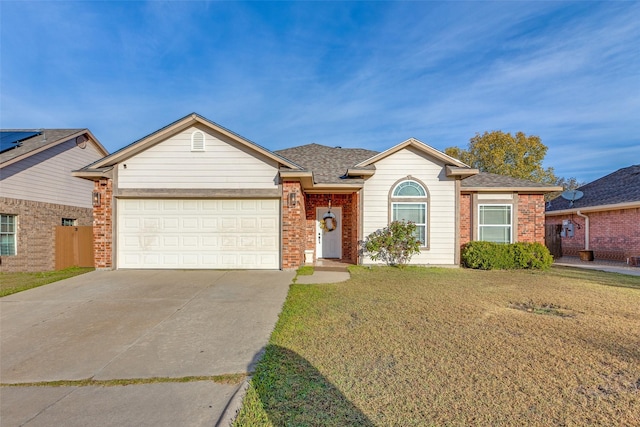 ranch-style house featuring a garage and a front yard