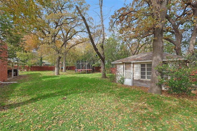 view of yard featuring a trampoline