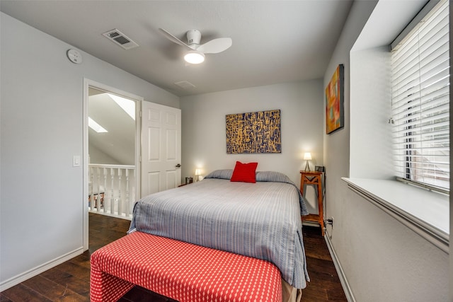 bedroom featuring ceiling fan and dark hardwood / wood-style flooring