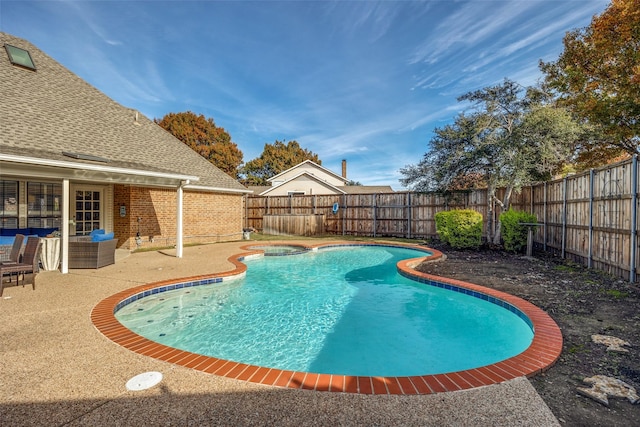 view of swimming pool with a patio