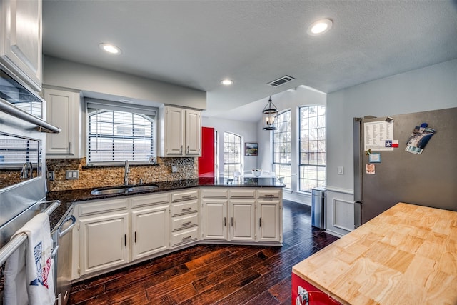 kitchen featuring white cabinets and stainless steel appliances