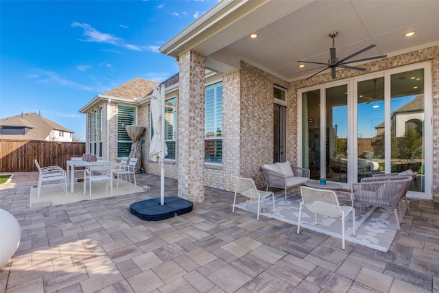 view of patio with ceiling fan and an outdoor hangout area