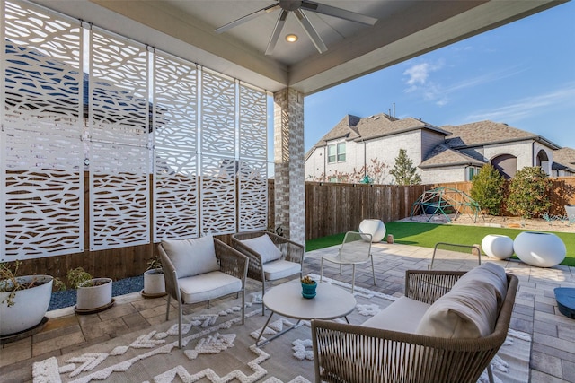 view of patio featuring ceiling fan and an outdoor living space