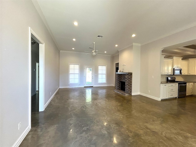 unfurnished living room with ornamental molding, a brick fireplace, and ceiling fan