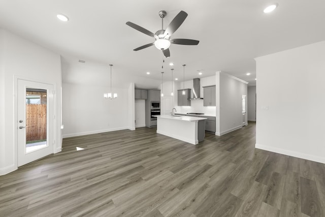 216 Hope Orchards, Lavon, TX 75166 - unfurnished living room featuring a sink, ceiling fan, baseboards, recessed lighting, and wood finished floors