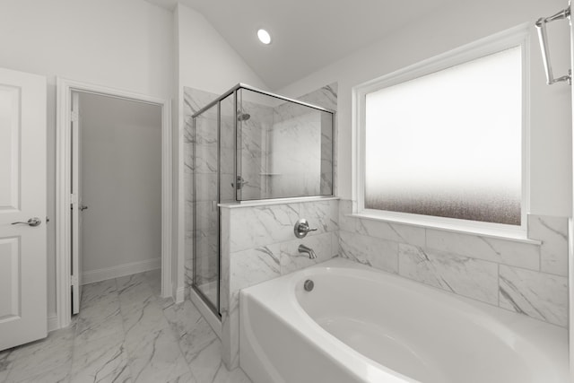 216 Hope Orchards, Lavon, TX 75166 - bathroom with a bath, a marble finish shower, marble look tile flooring, lofted ceiling, and baseboards