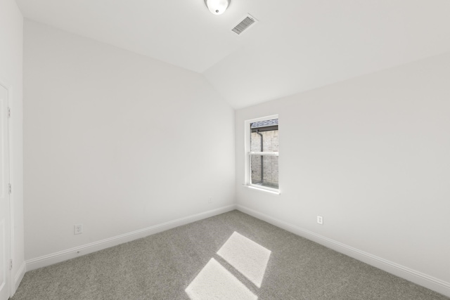 216 Hope Orchards, Lavon, TX 75166 - empty room featuring light carpet, vaulted ceiling, and baseboards