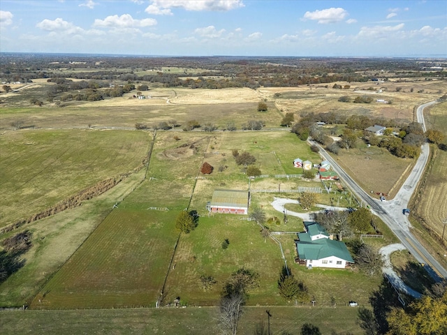 birds eye view of property featuring a rural view