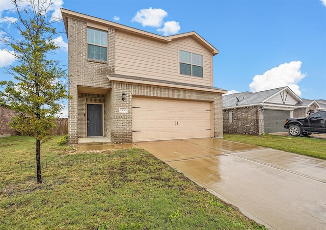 view of front of house featuring a garage and a front lawn