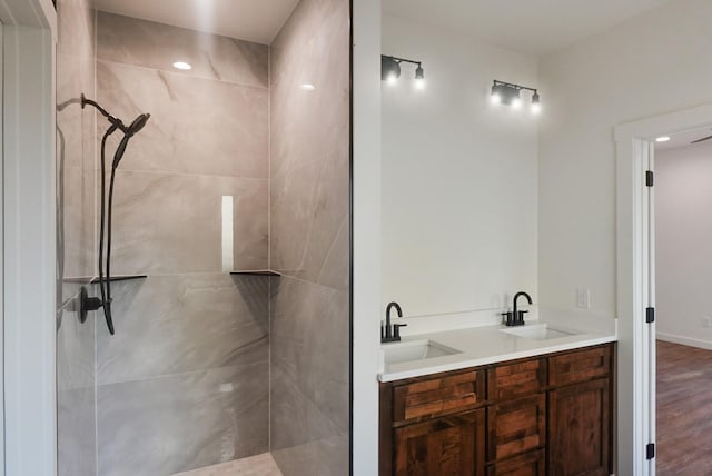 bathroom featuring vanity and hardwood / wood-style flooring