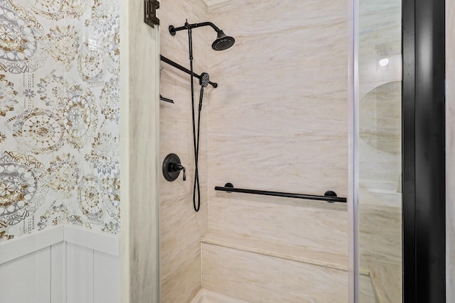 bathroom with a tile shower