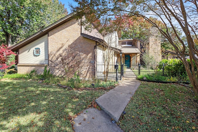 view of front of home with a front lawn