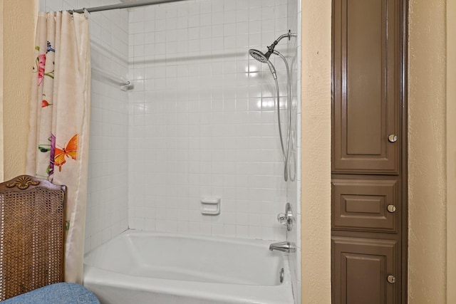 bathroom featuring shower / bath combo with shower curtain