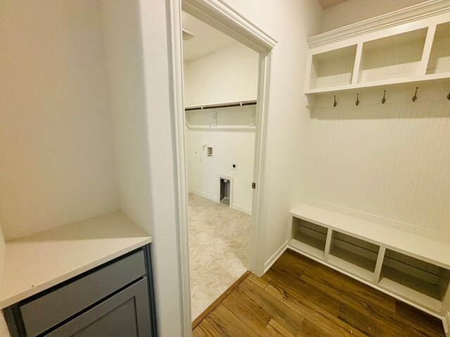 bathroom featuring toilet, a shower, and vanity