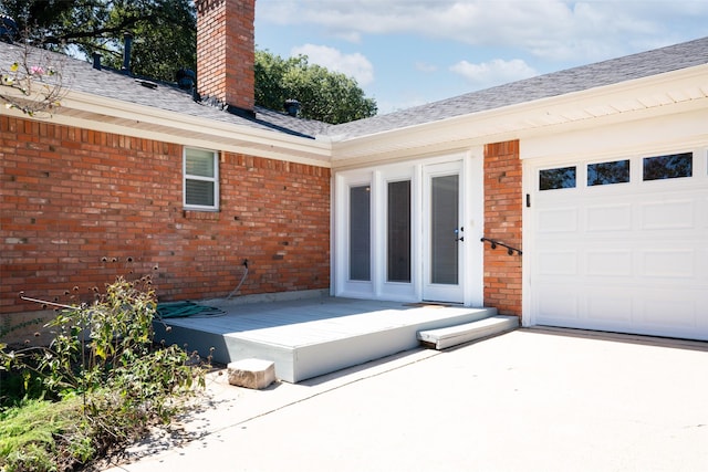 property entrance featuring a garage