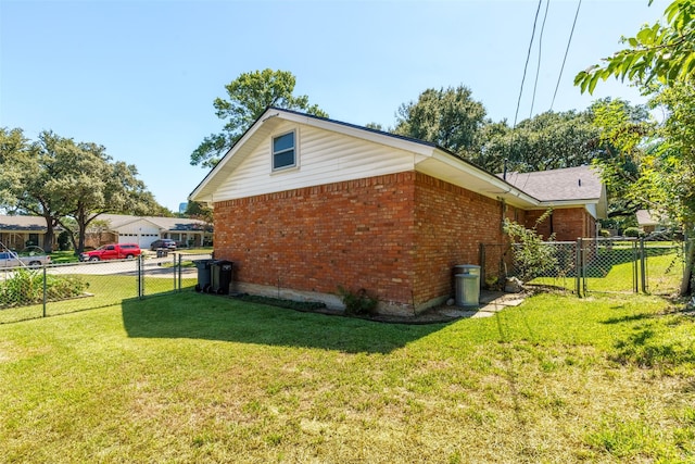 view of property exterior with a yard