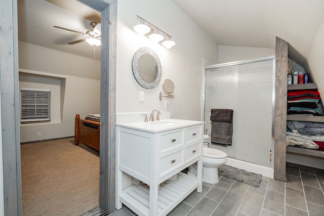 carpeted home office featuring lofted ceiling