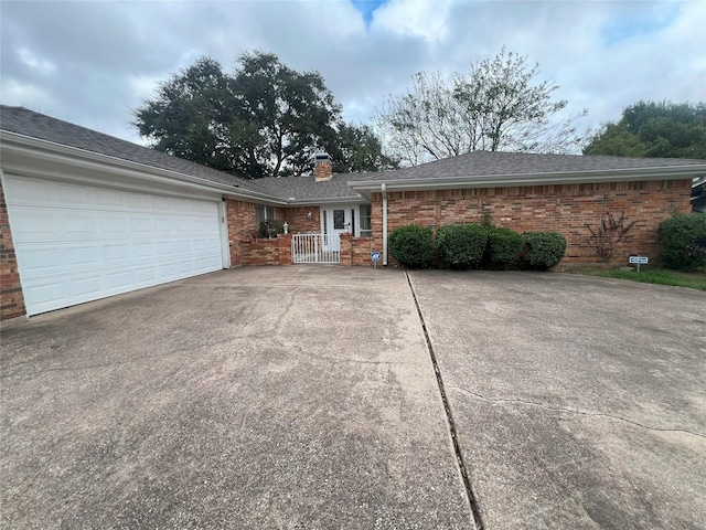 single story home with a garage