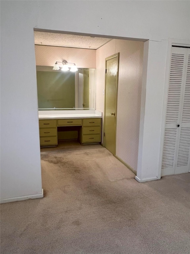 bathroom featuring vanity and a textured ceiling